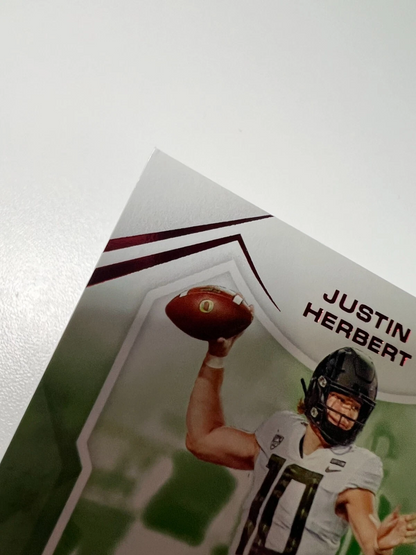 Justin Herbert 2022 Panini Chronicles Playoff Draft Picks Red /149 #19 Chargers