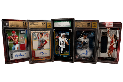 Five graded sports trading cards in black slabbed cases, including football, baseball, and basketball players, displayed against a white background.